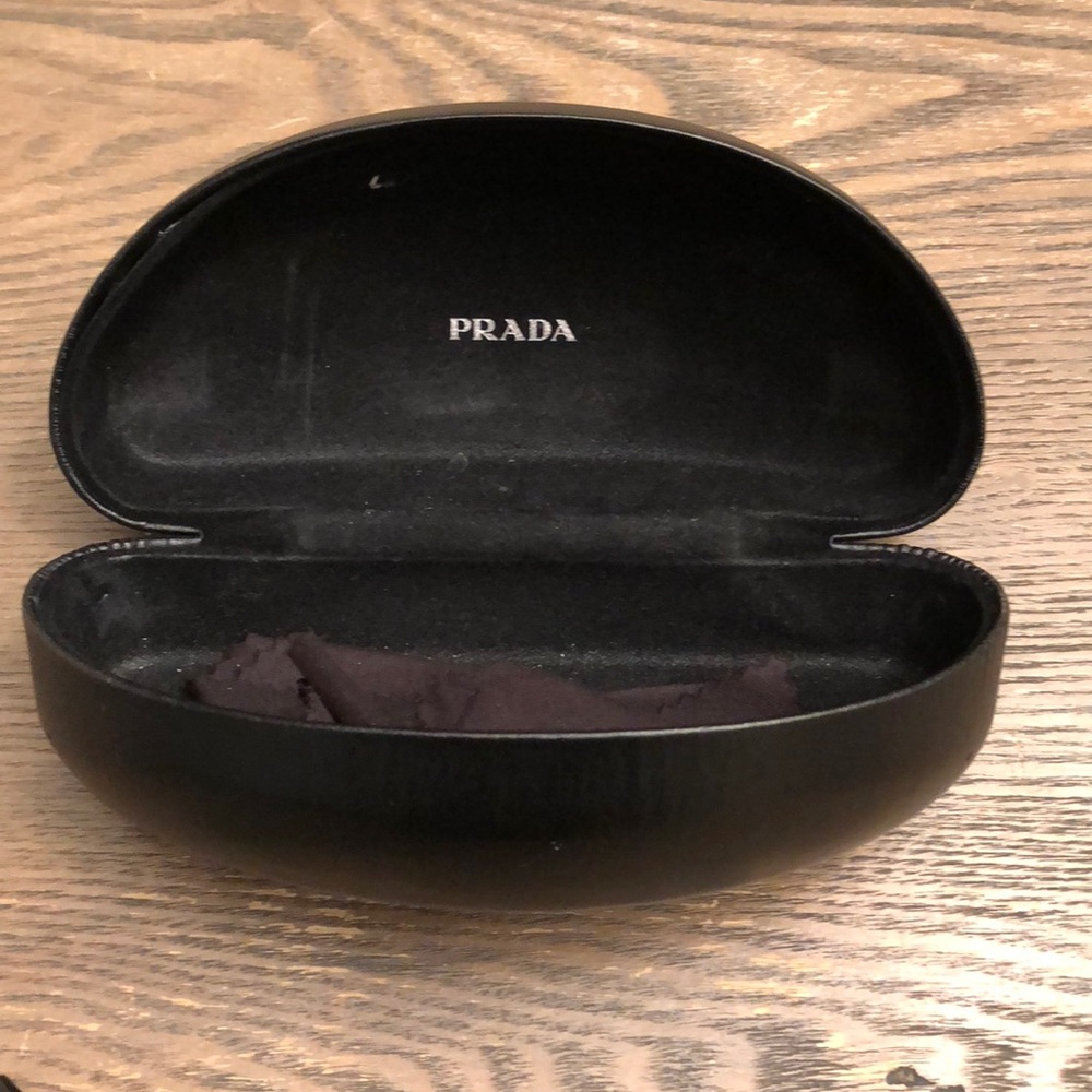 Prada Sunglasses w/ hard case.